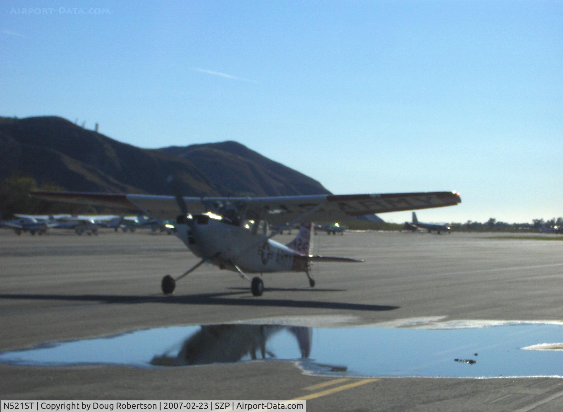 N521ST, Cessna 305C (0-1E) C/N 24584, Cessna 305C (O-1E) BIRD DOG, Continental O-470-11 213 Hp, taxi to Rwy 22