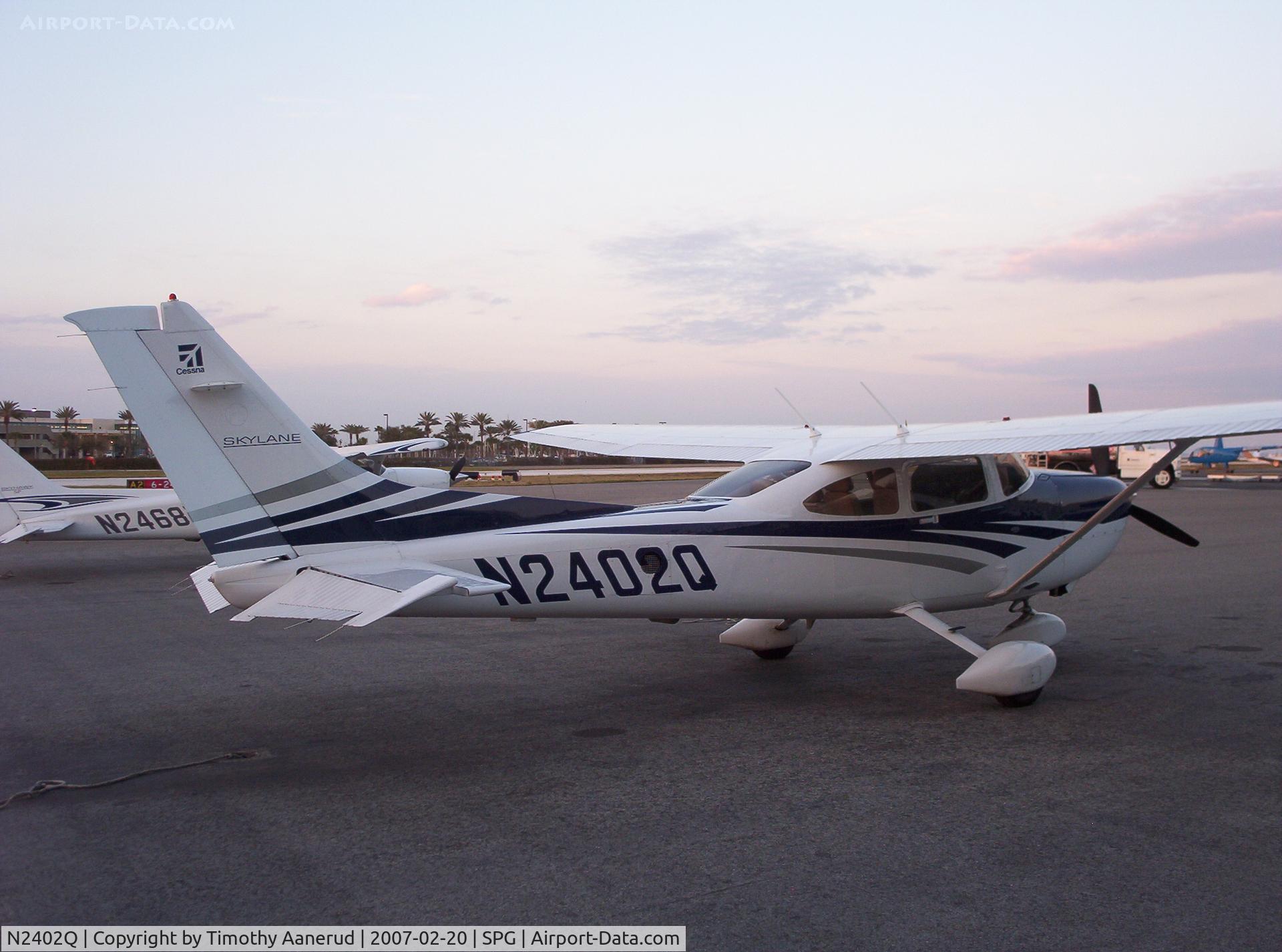 N2402Q, 2006 Cessna 182T Skylane C/N 18281756, Parked at Albert Whitted Airport, in the second number 2 there is a screened vent of some sort. 2006 Cessna 182T Skylane, c/n 18281756