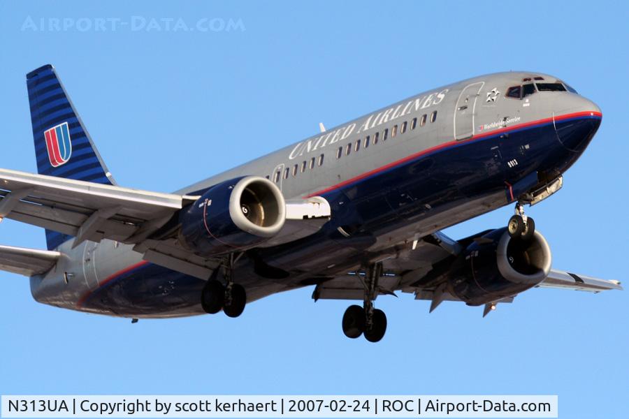 N313UA, 1987 Boeing 737-322 C/N 23674, landing 22 from ORD