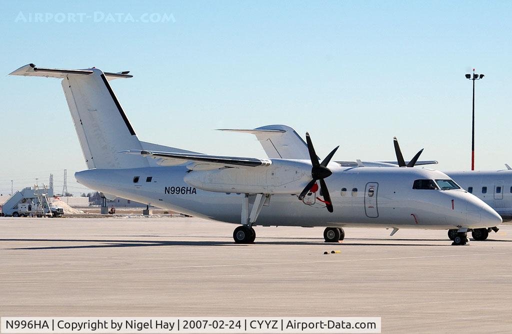 N996HA, 1997 De Havilland Canada DHC-8-201 Dash 8 C/N 497, Parked in the infield at YYZ