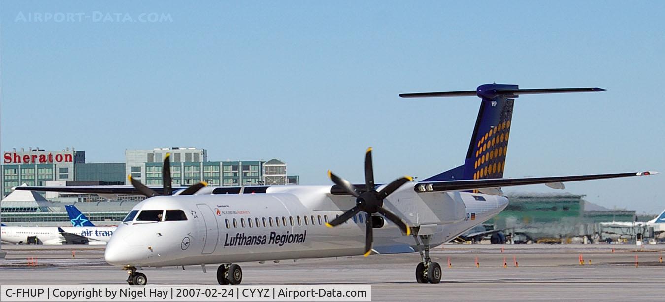 C-FHUP, 1998 De Havilland Canada DHC-8-402Q Dash 8 C/N 4003, Painted in Lufthansa colours with a Canadian registration