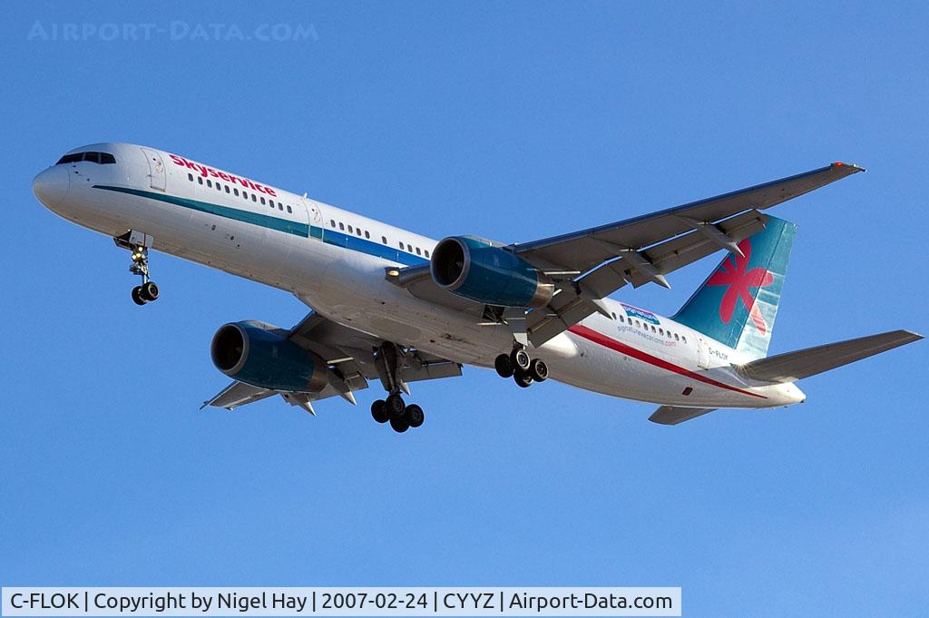 C-FLOK, 1991 Boeing 757-236 C/N 25054, Landing on 06L with the late day winter sun shinning on