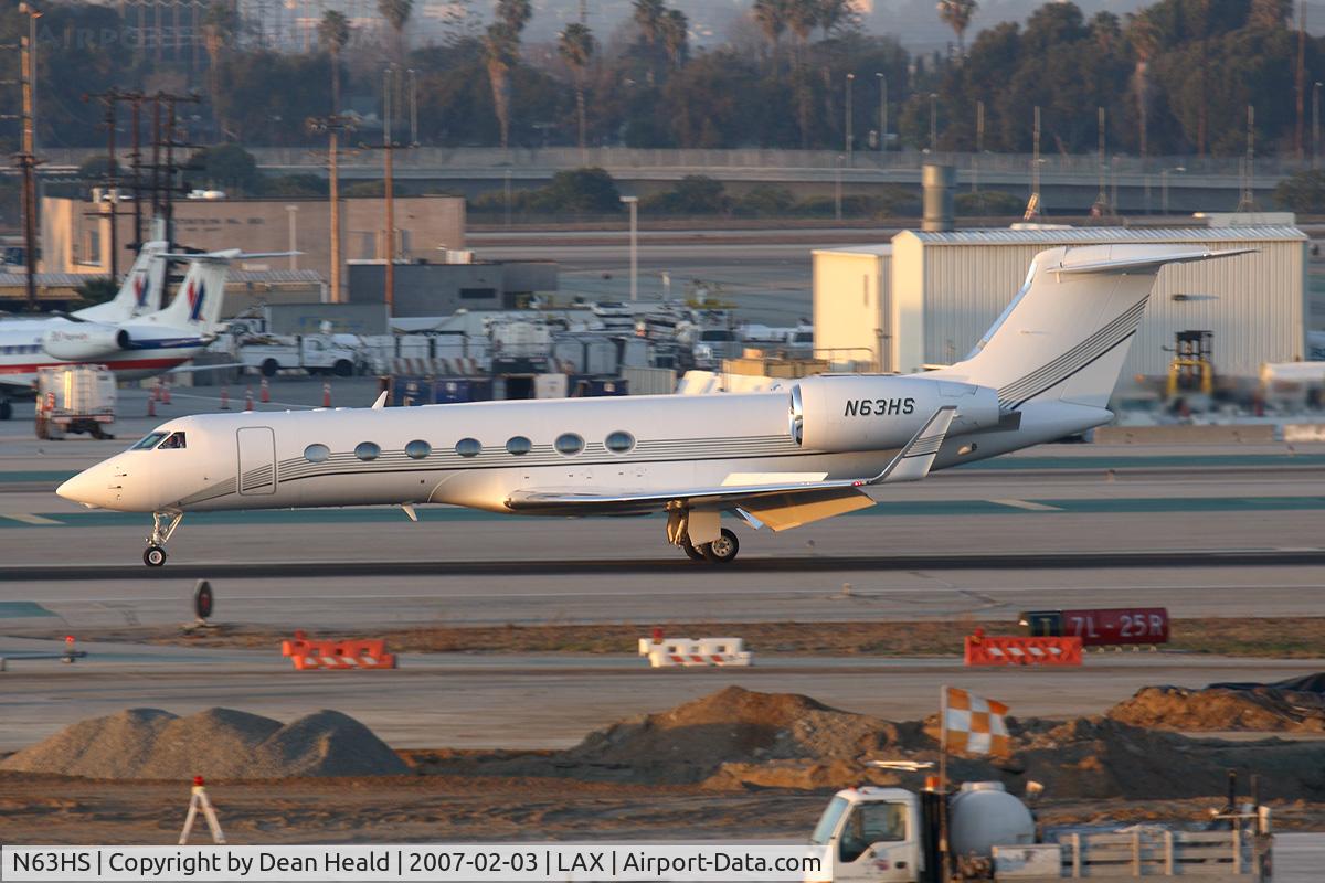 N63HS, 2004 Gulfstream Aerospace GV-SP (G550) C/N 5013, 2004 Gulfstream G-V(SP) G550 N63HS rolling out on RWY 25R after landing.