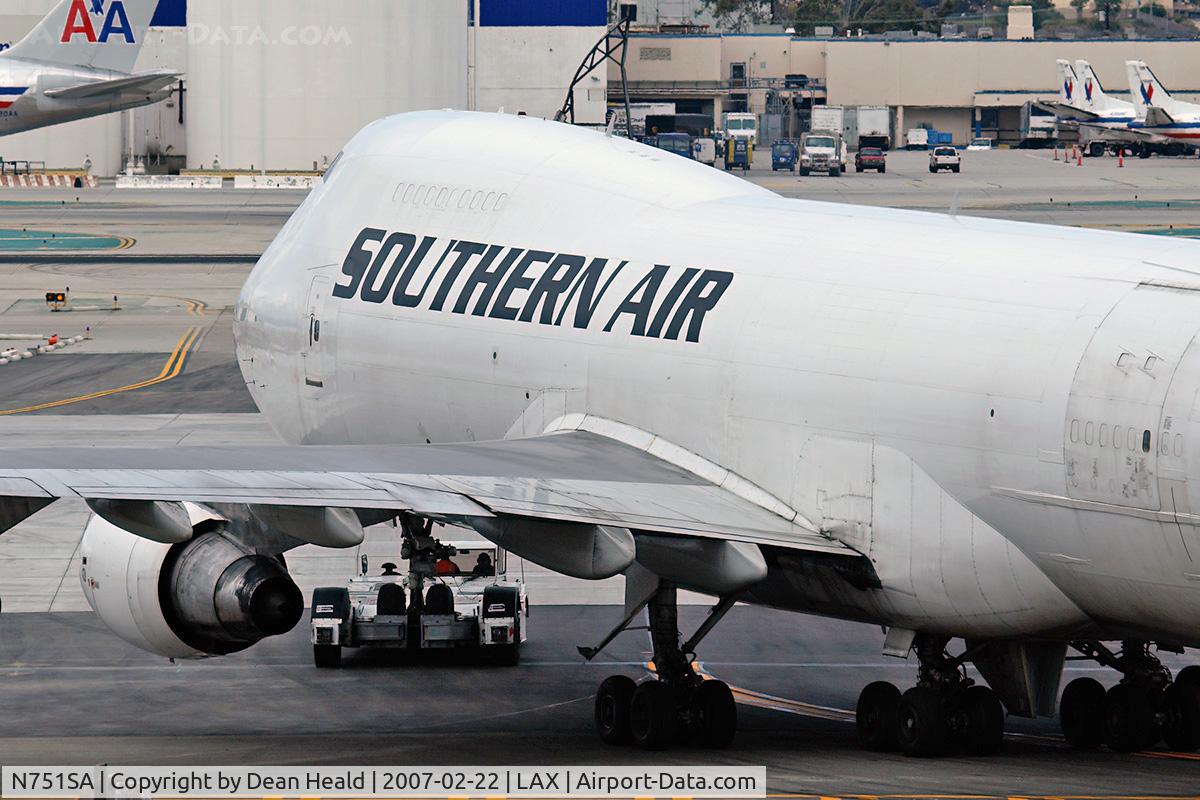 N751SA, 1981 Boeing 747-228F C/N 22678, Not often seen...a 'super-tug' towing this bird to a holding area.
