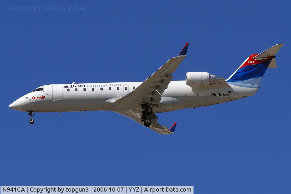 N941CA, 1994 Canadair CRJ-100ER (CL-600-2B19) C/N 7050, Short final for RWY24R.