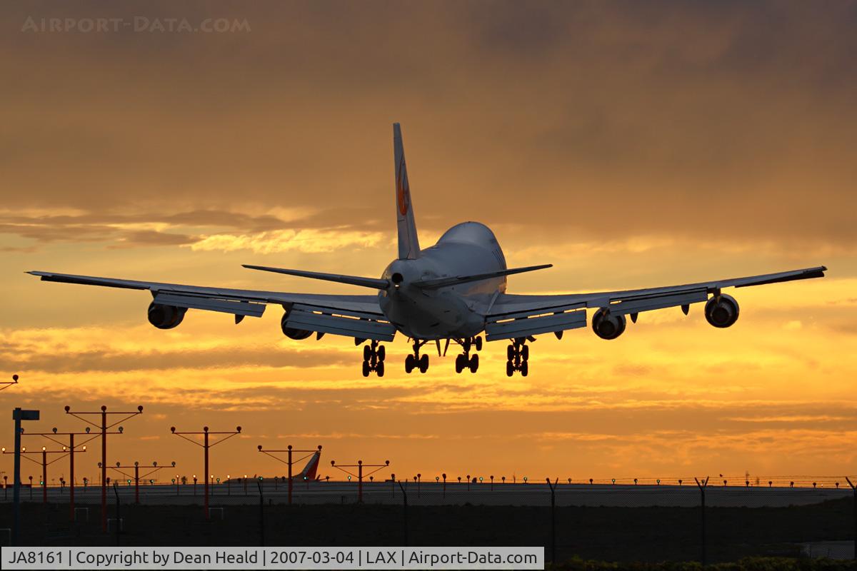 JA8161, 1983 Boeing 747-246B(SF) C/N 22990, JAL Cargo JA8161 (FLT JAL6186) from San Francisco Int'l (KSFO) seconds from landing on RWY 24R with a brilliant sky minutes before sunset.