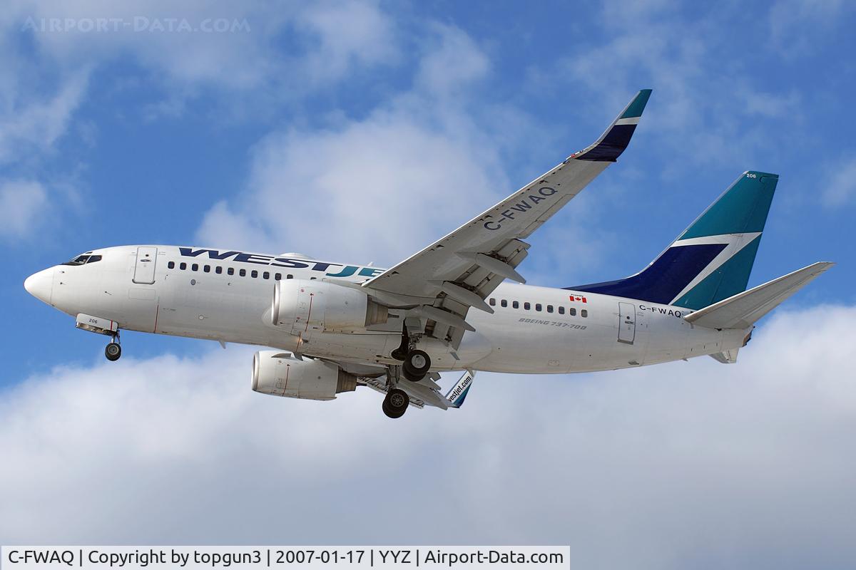 C-FWAQ, 2002 Boeing 737-7CT C/N 32748, Short final for RWY23.