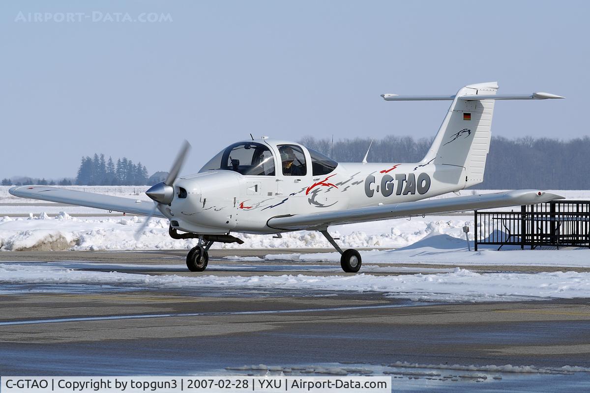 C-GTAO, 1979 Piper PA-38-112 Tomahawk Tomahawk C/N 38-79A1002, Parked in front of Katana Kafe.