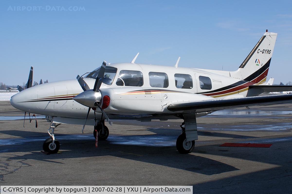C-GYRS, 1973 Piper PA-31 Turbo Navajo B C/N 31-7300937, Parked at ESSO ramp.