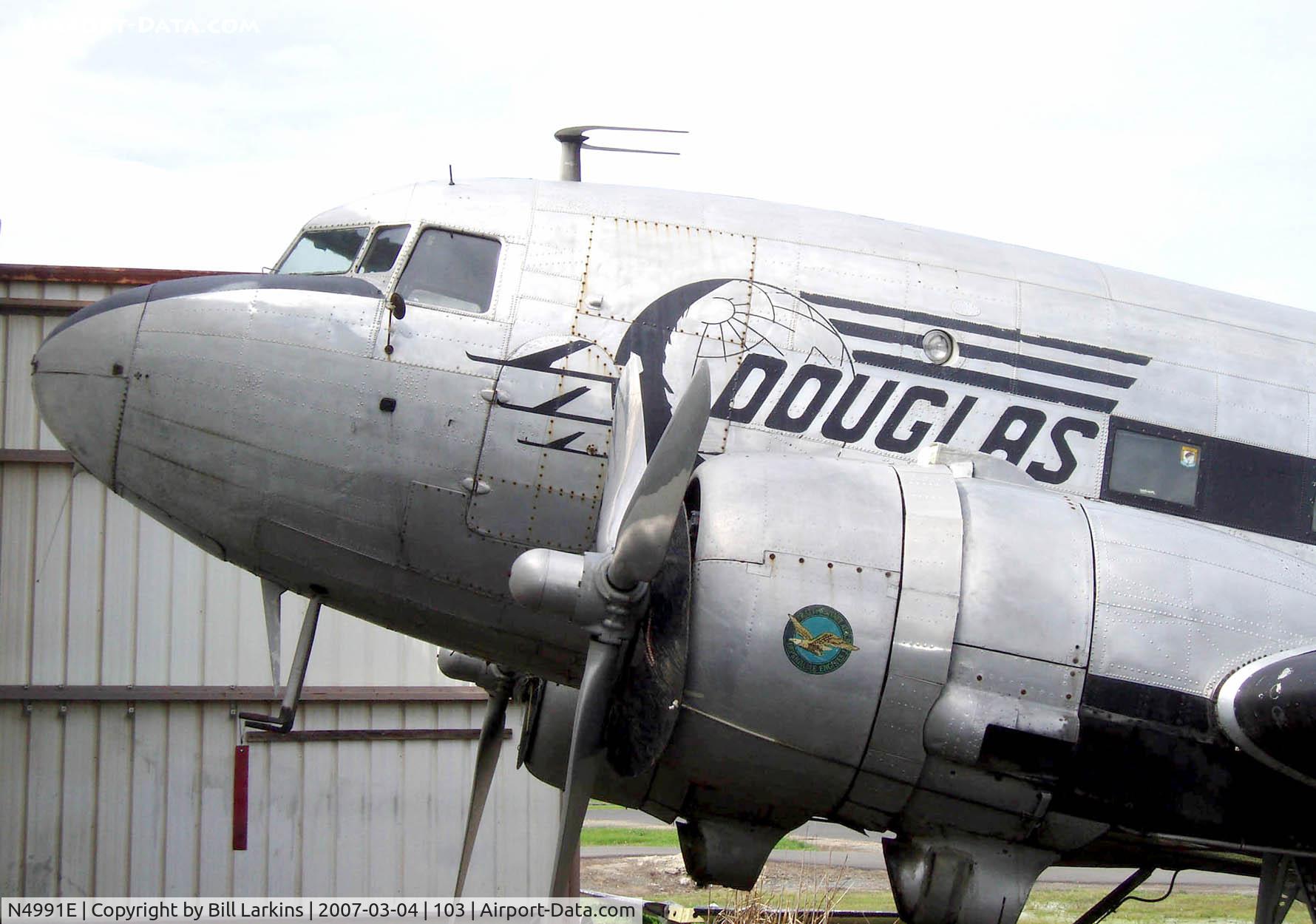 N4991E, 1945 Douglas DC3C (C-47) C/N 12106, Closeup of nose lettering.