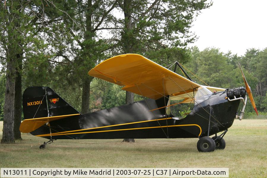 N13011, 1998 Aeronca C.3 Replica C/N 571833, Under trees at Brodhead