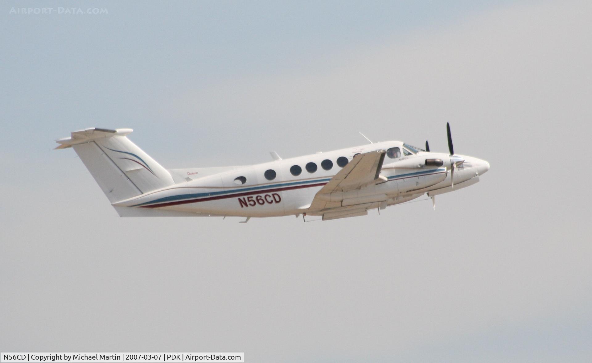 N56CD, 1975 Beech 200 King Air C/N BB-64, Departing PDK enroute to MEM