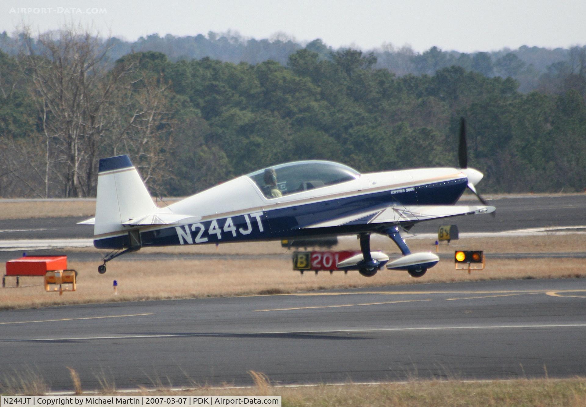 N244JT, Extra EA-300/L C/N 068, Departing Runway 20R