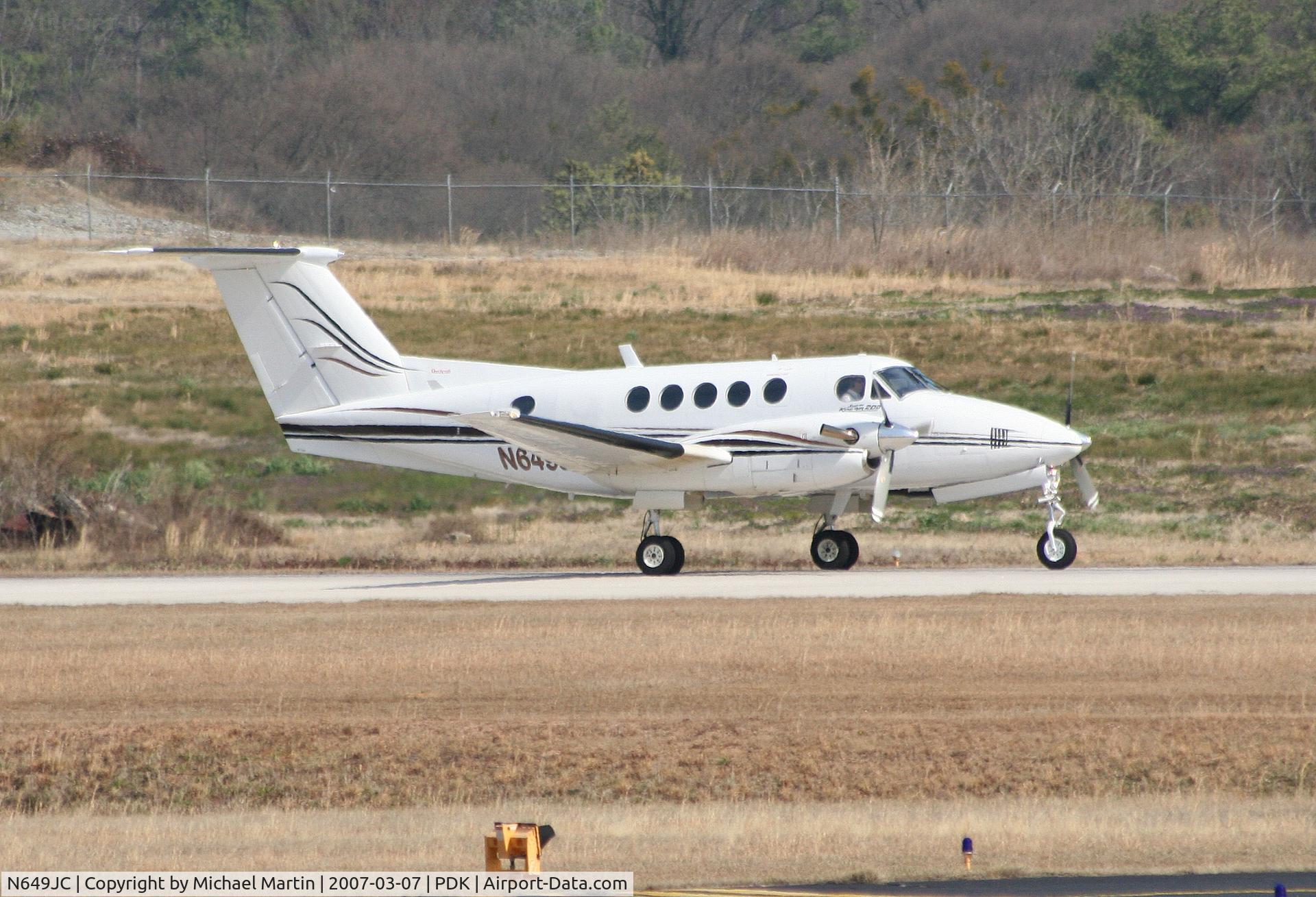 N649JC, 1980 Beech 200 C/N BB-649, Departing Runway 20L