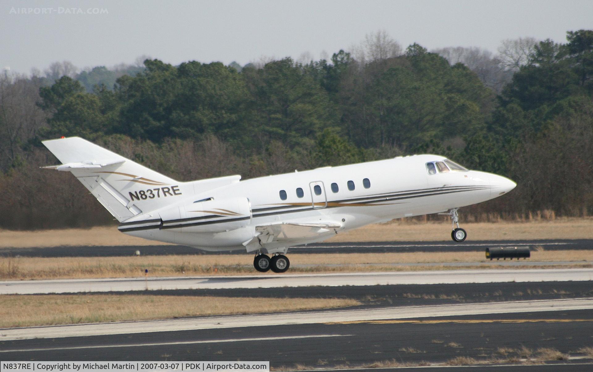 N837RE, 2001 Raytheon Hawker 800XP C/N 258526, Departing PDK enroute to APA