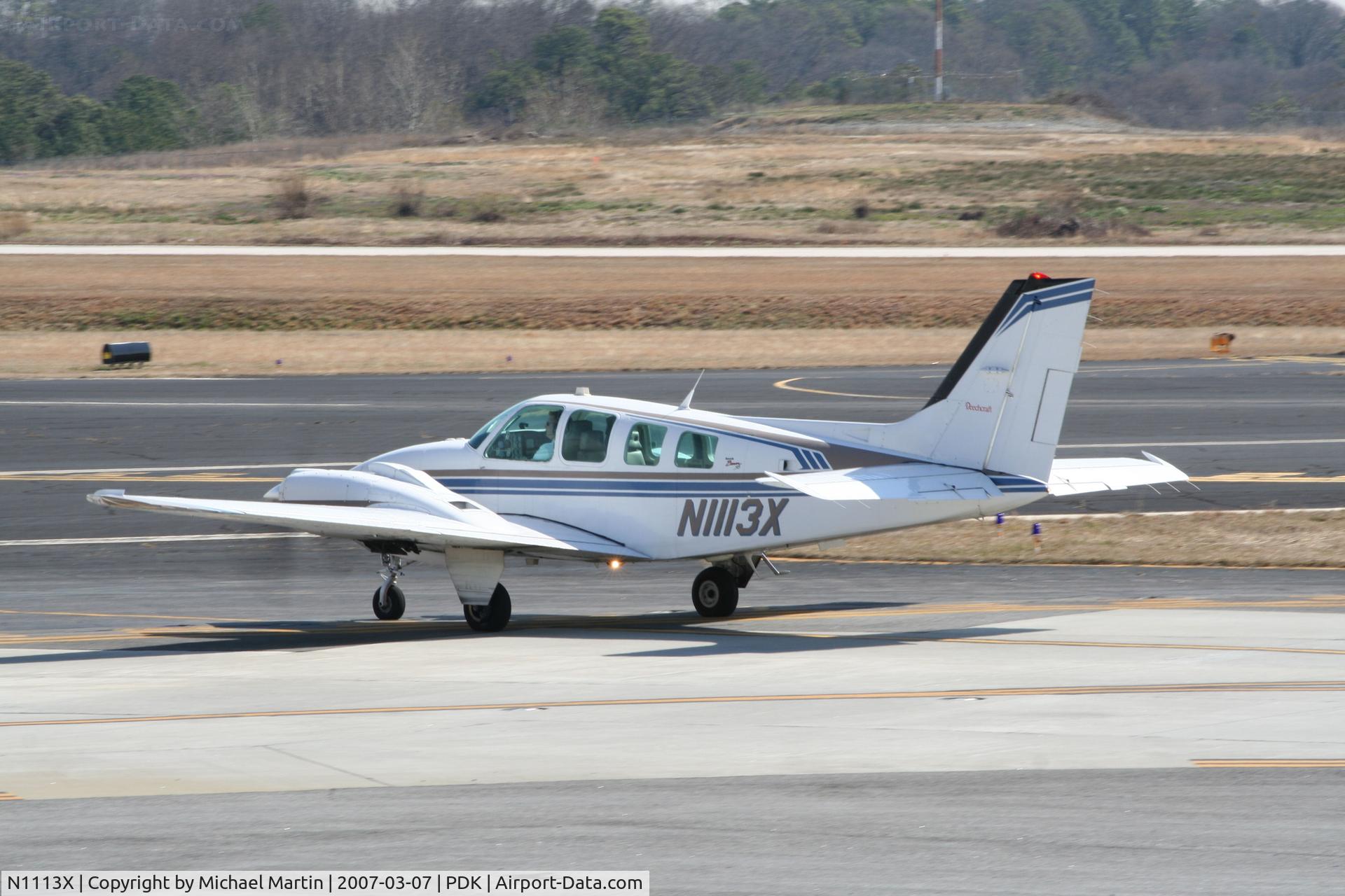 N1113X, 1997 Raytheon Aircraft Company 58 C/N TH-1813, Taxing to Runway 20R