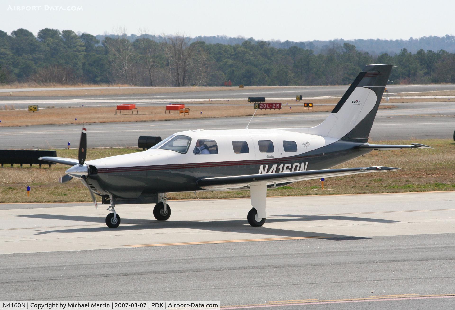 N4160N, 2000 Piper PA-46-350P Malibu Mirage C/N 4636280, Taxing to Epps Air Service