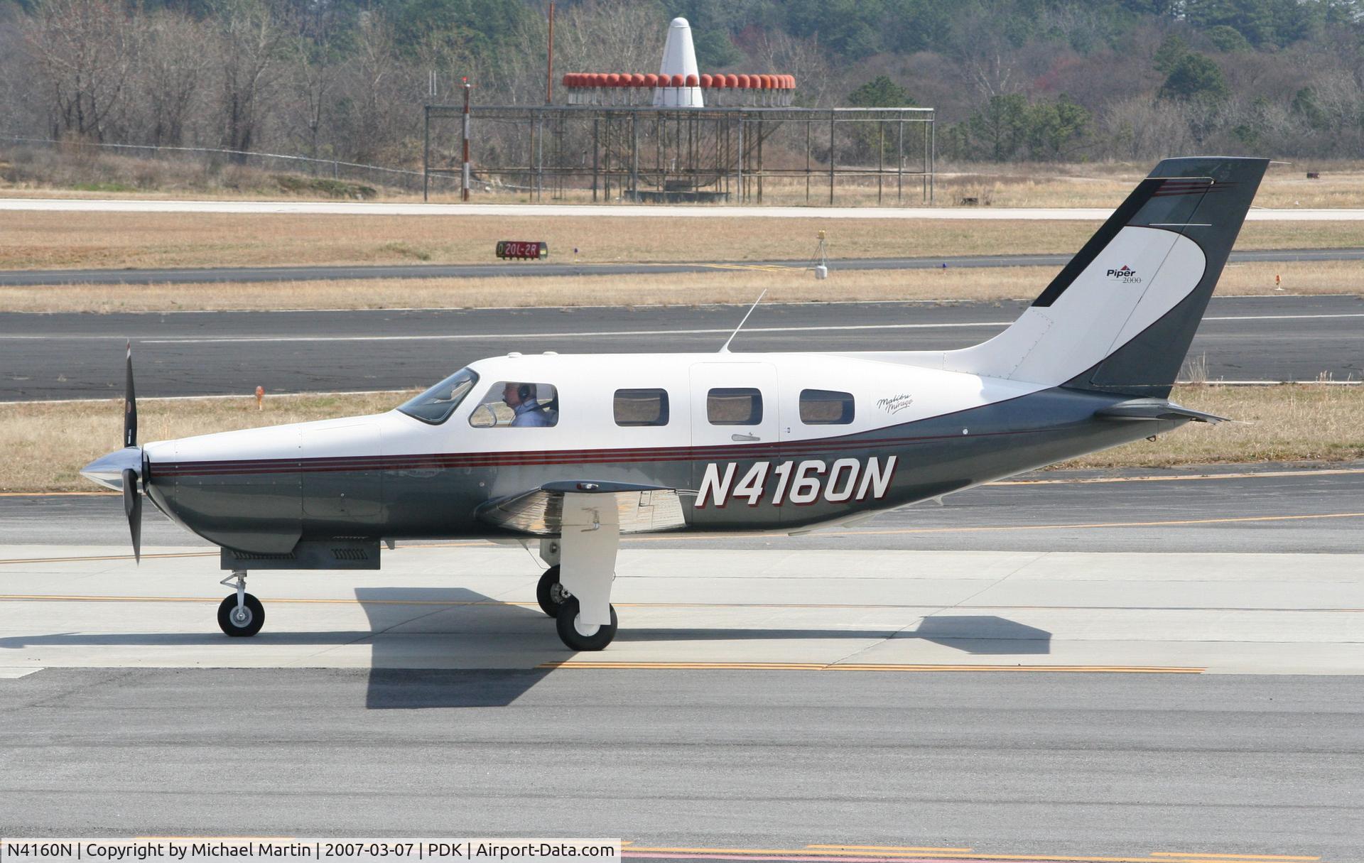 N4160N, 2000 Piper PA-46-350P Malibu Mirage C/N 4636280, Taxing to Epps Air Service