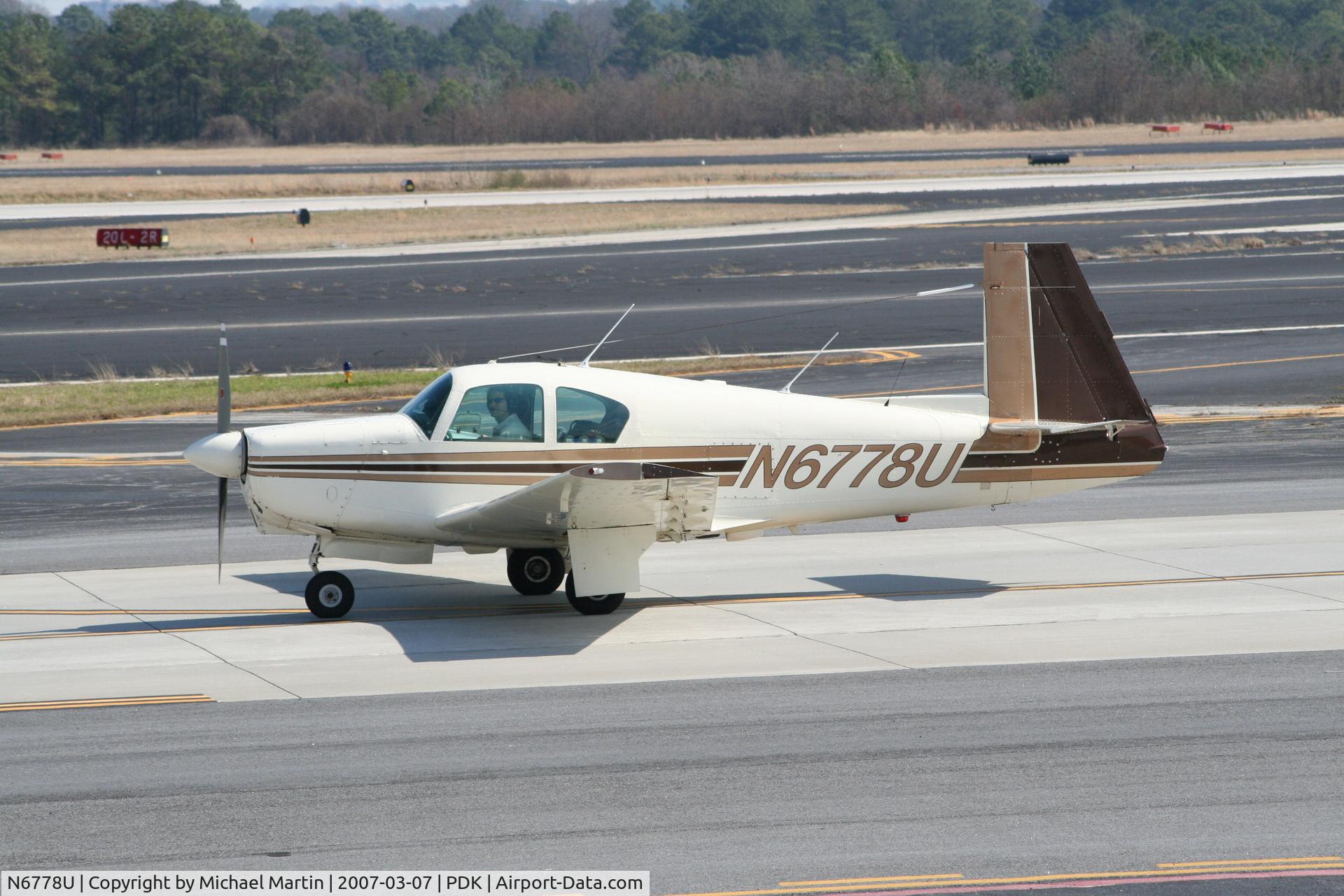 N6778U, 1963 Mooney M20C Ranger C/N 2500, Taxing back from flight