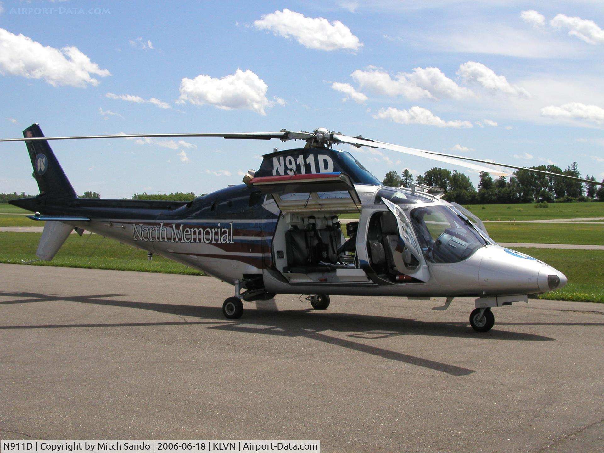 N911D, Agusta A-109C Max C/N 7637, Air Care 1 with the side doors open to keep the wind flowing through on a hot spring day.