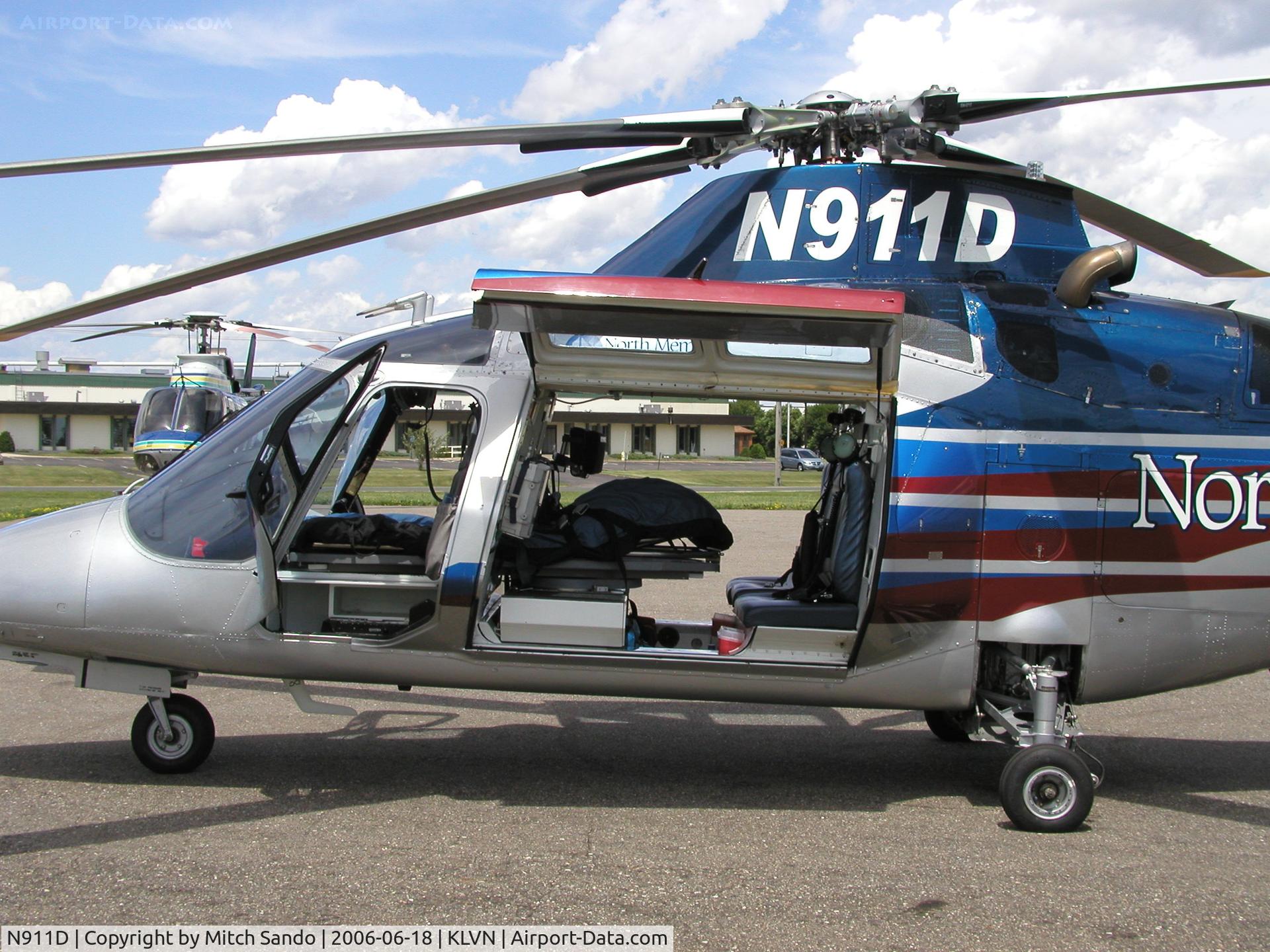 N911D, Agusta A-109C Max C/N 7637, Air Care 1 with his rival Life Link III in the background at Airlake Airport in Lakeville, MN.