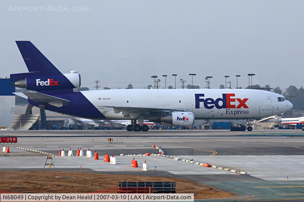 N68049, 1973 McDonnell Douglas MD-10-10F C/N 47803, FedEx N68049 (FLT FDX912) from Memphis Int'l (KMEM) taxiing to the cargo terminal after arrival on the north complex.