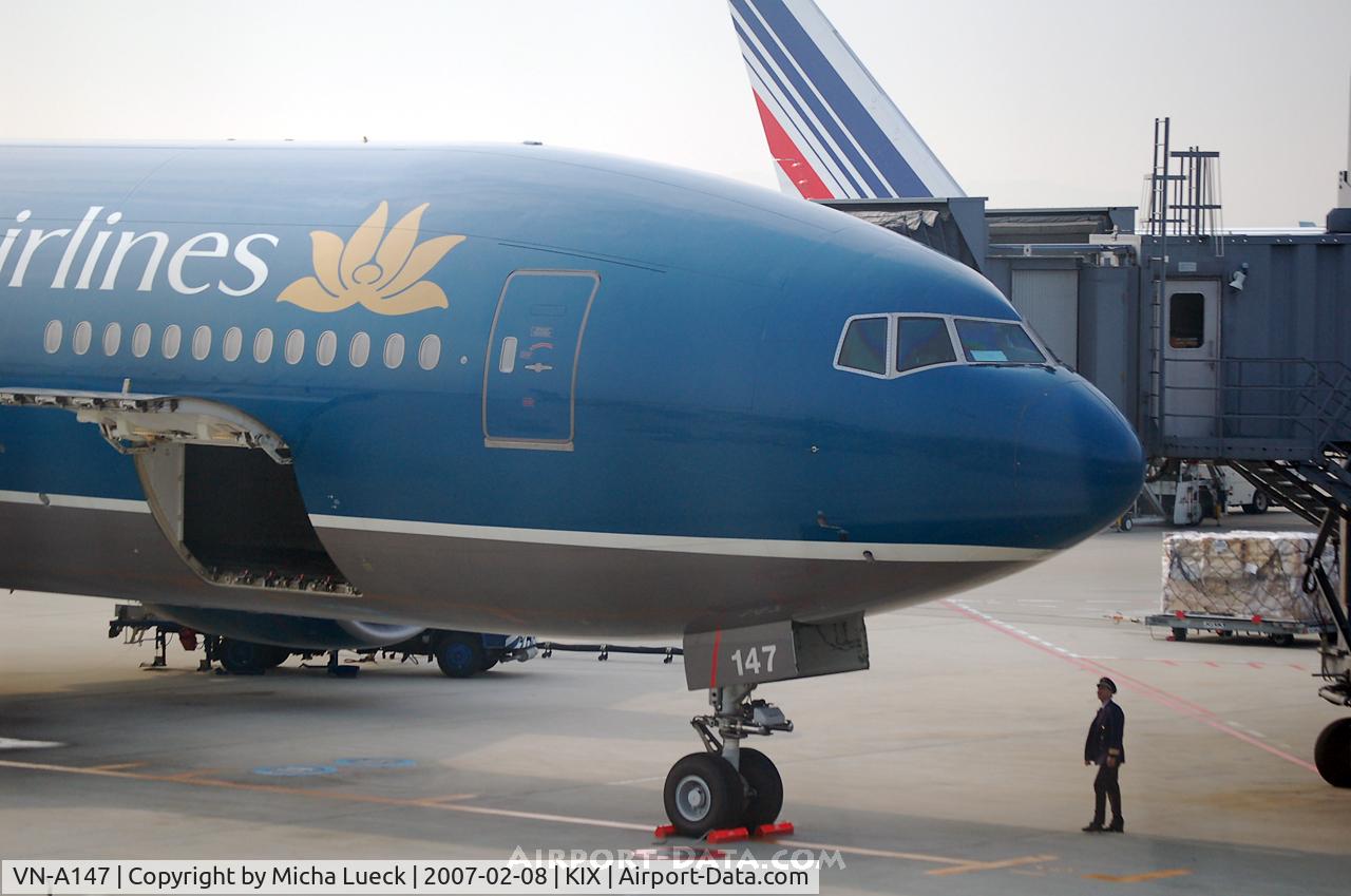VN-A147, 1998 Boeing 777-2Q8/ER C/N 27607, Small man and big machine...