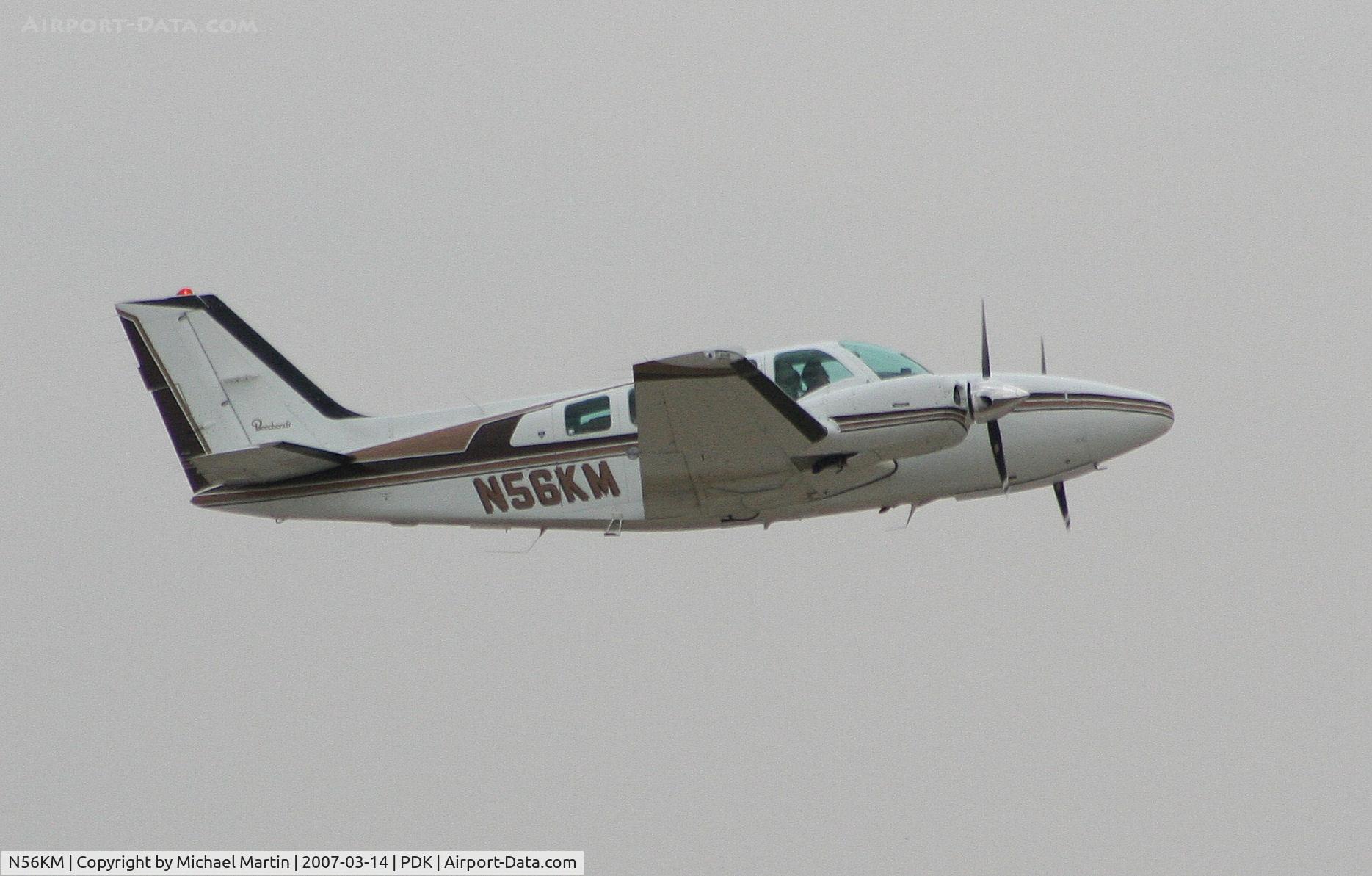 N56KM, 1983 Beech 58 Baron C/N TH-1391, Departing PDK for parts unknown!