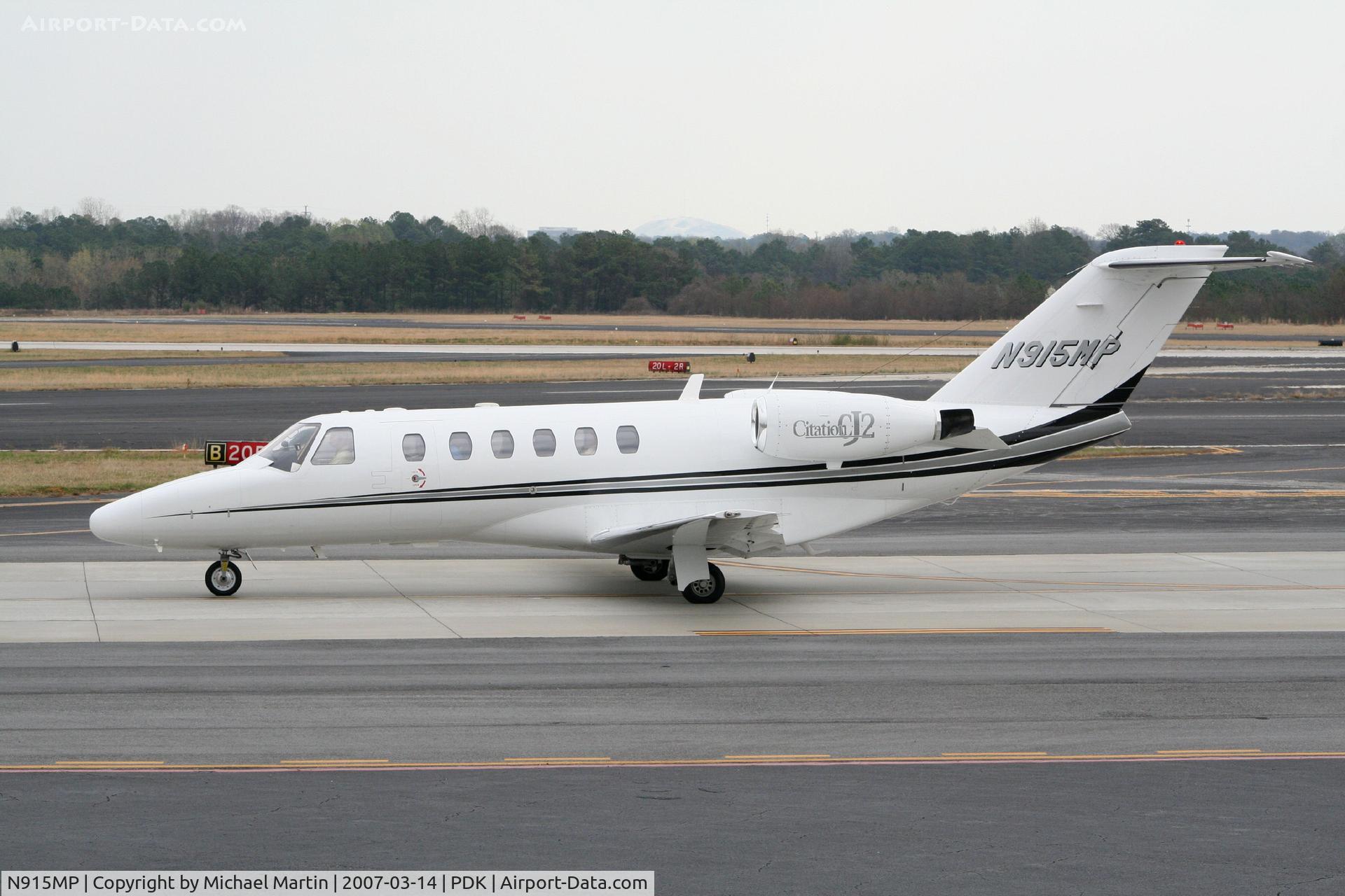 N915MP, 2001 Cessna 525A CitationJet CJ2 C/N 525A0024, Taxing to Epps Air Service