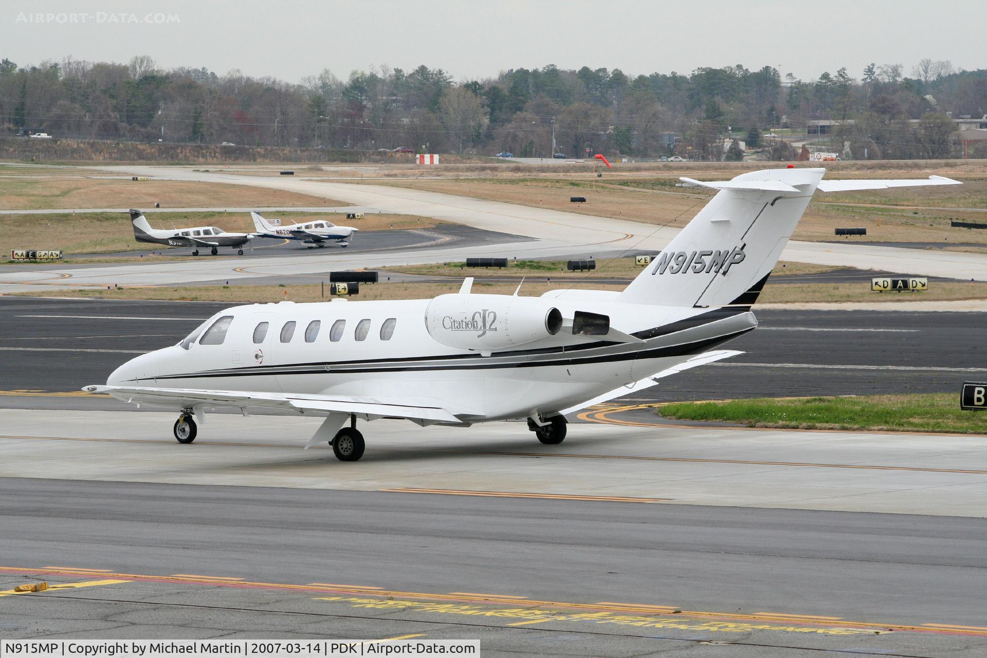 N915MP, 2001 Cessna 525A CitationJet CJ2 C/N 525A0024, Taxing to Epps Air Service