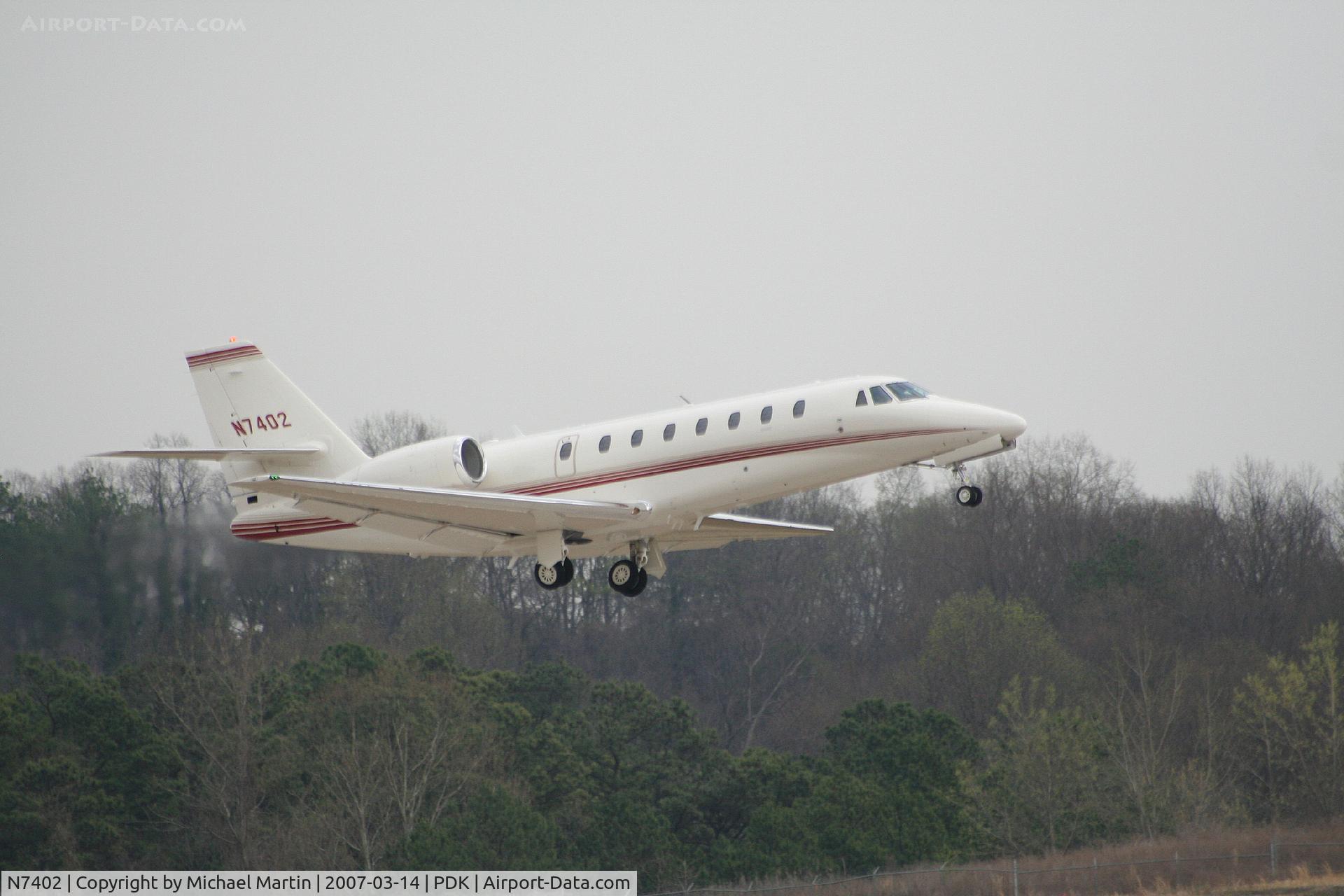 N7402, 2006 Cessna 680 Citation Sovereign C/N 680-0082, Departing PDK enroute to MCO