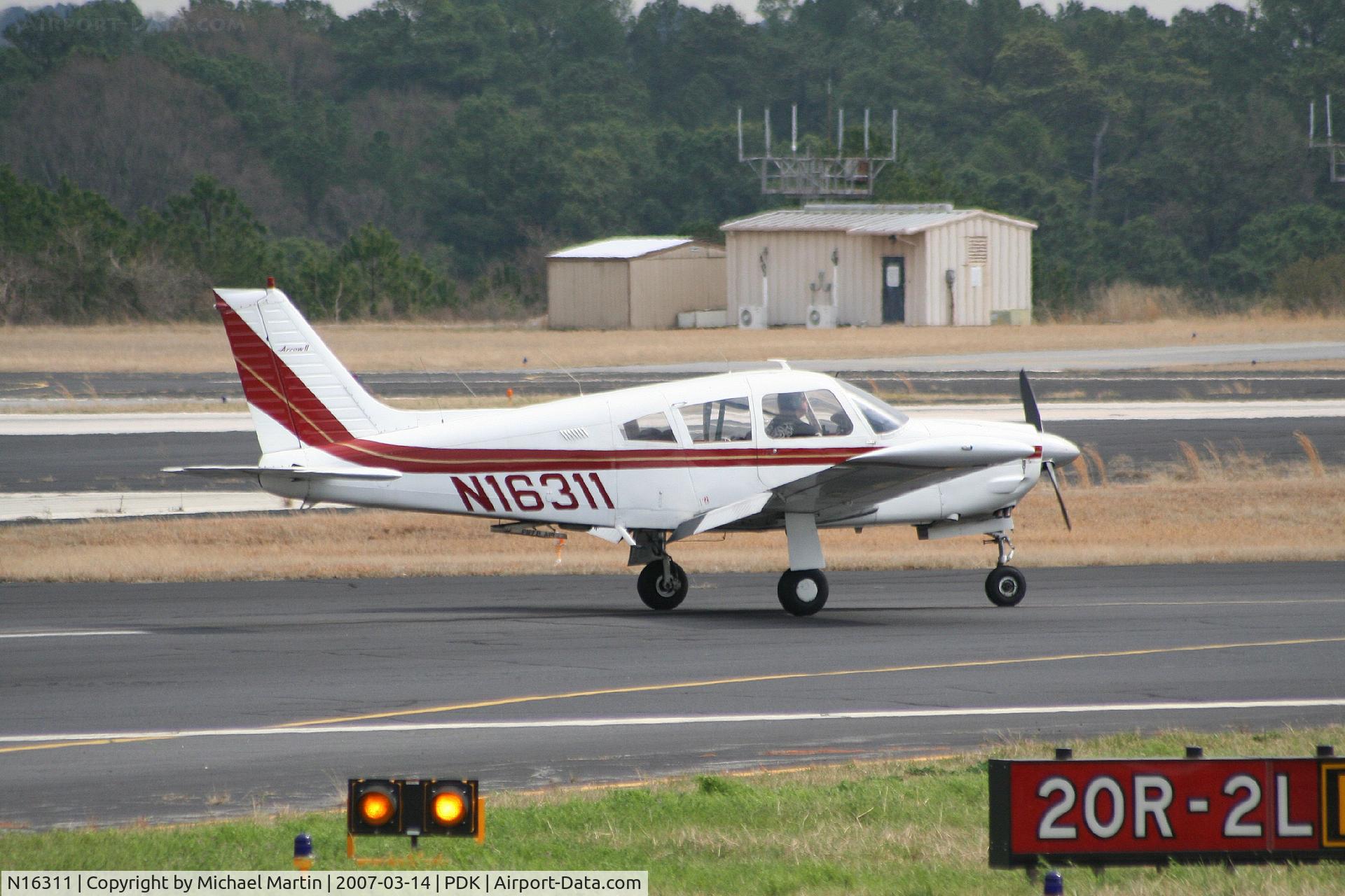 N16311, 1973 Piper PA-28R-200 C/N 28R-7335124, Landing Runway 20R