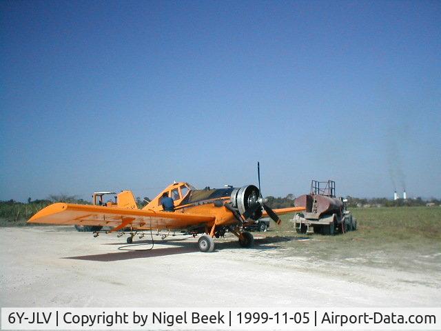 6Y-JLV, 1990 Ayres S2R-1820 Thrush C/N R1820-035DC, Out refuelling at a Sugar plantation 15 NM south Of MKJS