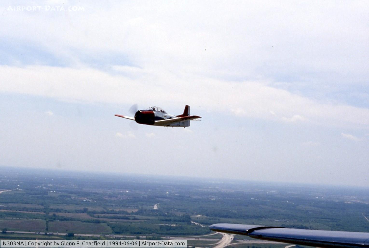 N303NA, 1954 North American T-28B C/N 137808, Shot from the turret position of a TBM, D-Day flight