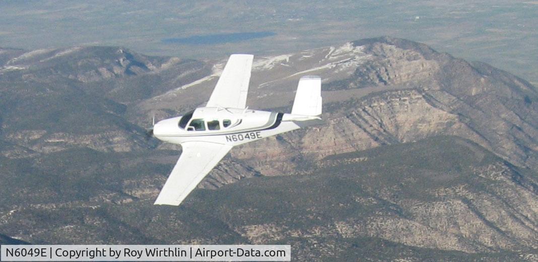 N6049E, 1959 Beech K35 Bonanza C/N D-5982, N6049E over the Colorado Rockies