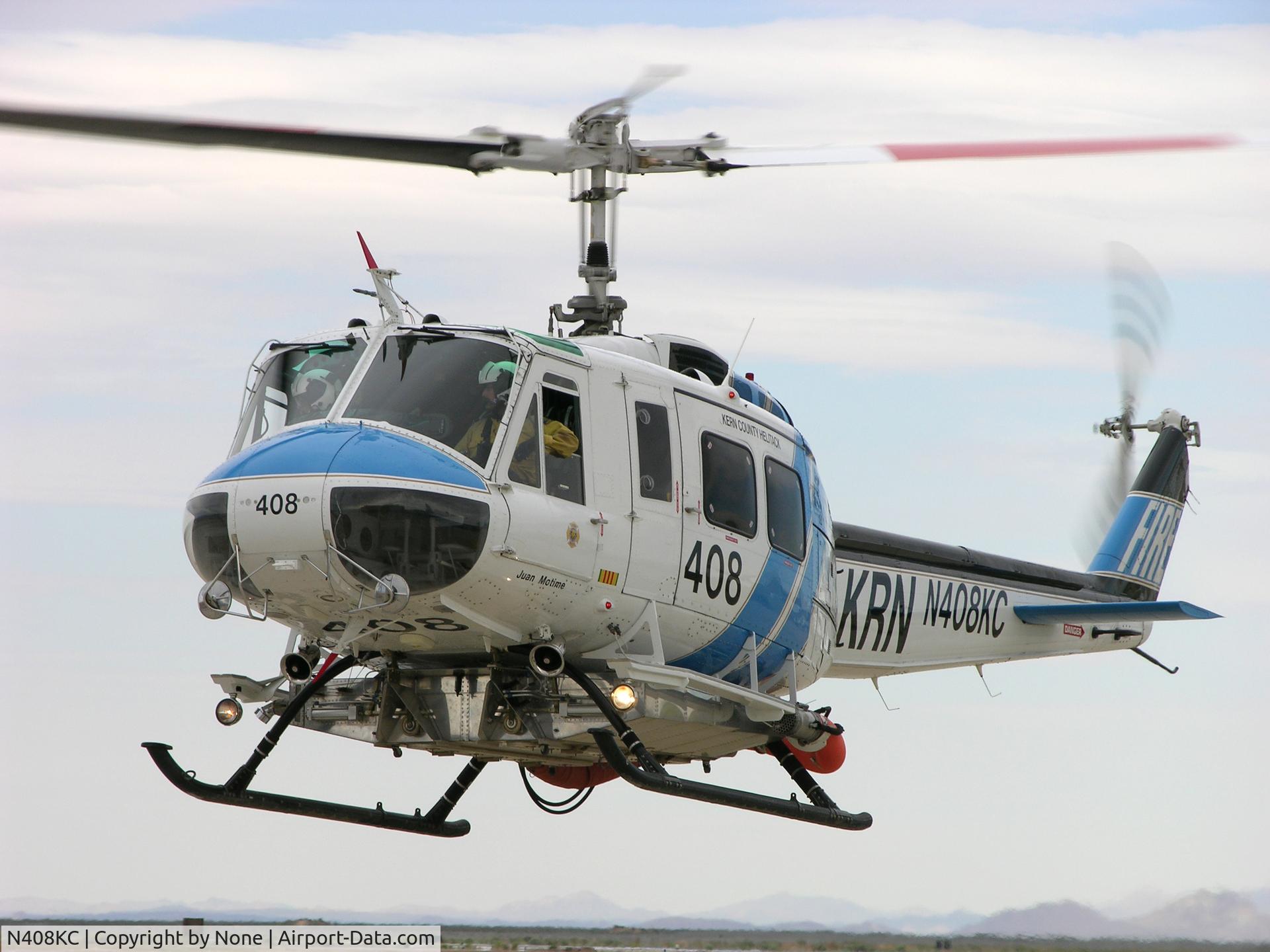N408KC, 1967 Bell UH-1H Iroquois C/N 9923, Kern County (California) Fire Department's Bell 205 departs from the Mojave Spaceport