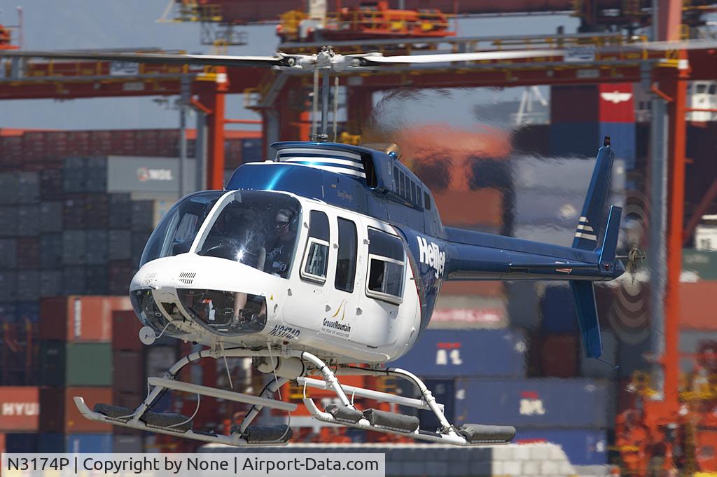 N3174P, 1982 Bell 206L-1 LongRanger II C/N 45741, Bell 206L-1 Long Ranger II landing at Vancouver Harbour Helijet pad.