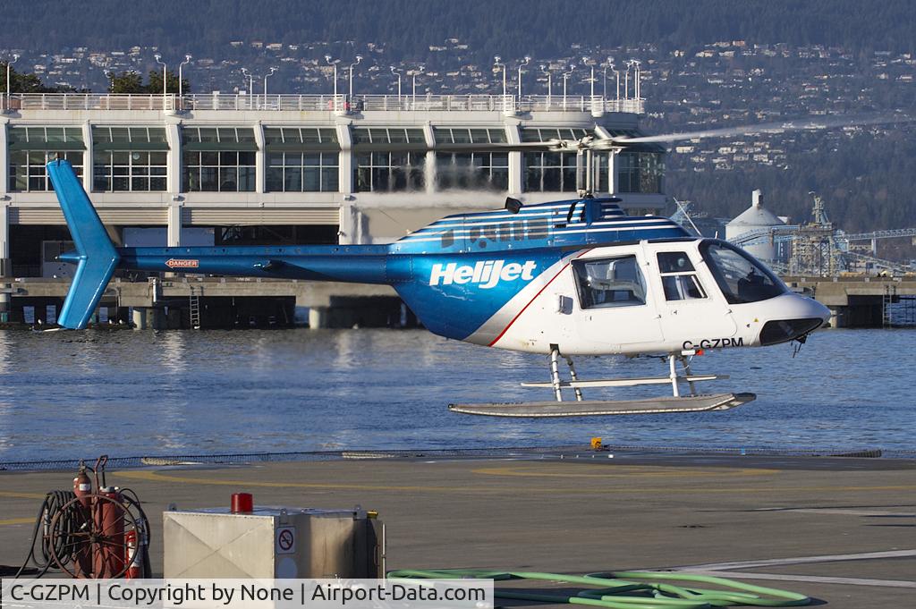 C-GZPM, 1972 Bell 206B JetRanger II C/N 880, Bell 206L-1 Long Ranger II taking off from Vancouver Harbour HeliJet pad.