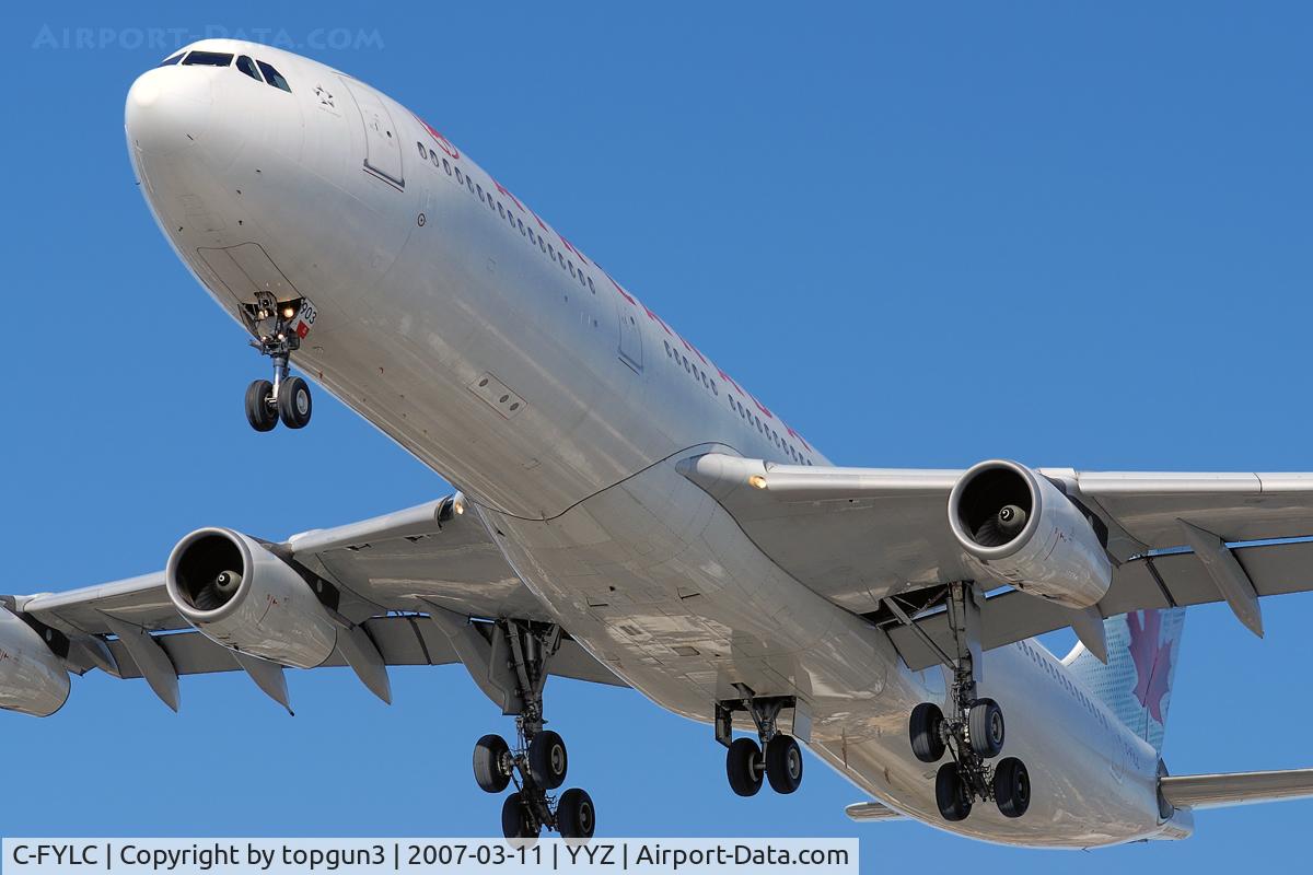 C-FYLC, 1997 Airbus A340-313X C/N 167, Short final for RWY23.