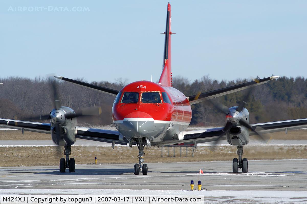 N424XJ, 1997 Saab 340B C/N 340B424, Turning onto Golf from Alpha.