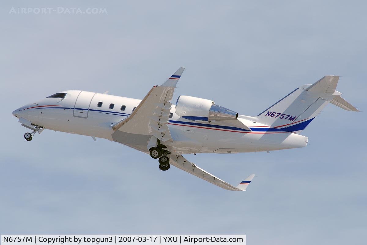 N6757M, 2002 Bombardier Challenger 604 (CL-600-2B16) C/N 5545, Departing RWY33.