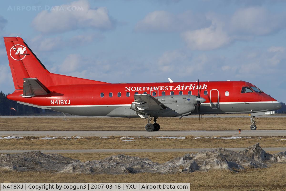 N418XJ, 1997 Saab 340B C/N 340B-418, Taxiing on Golf.