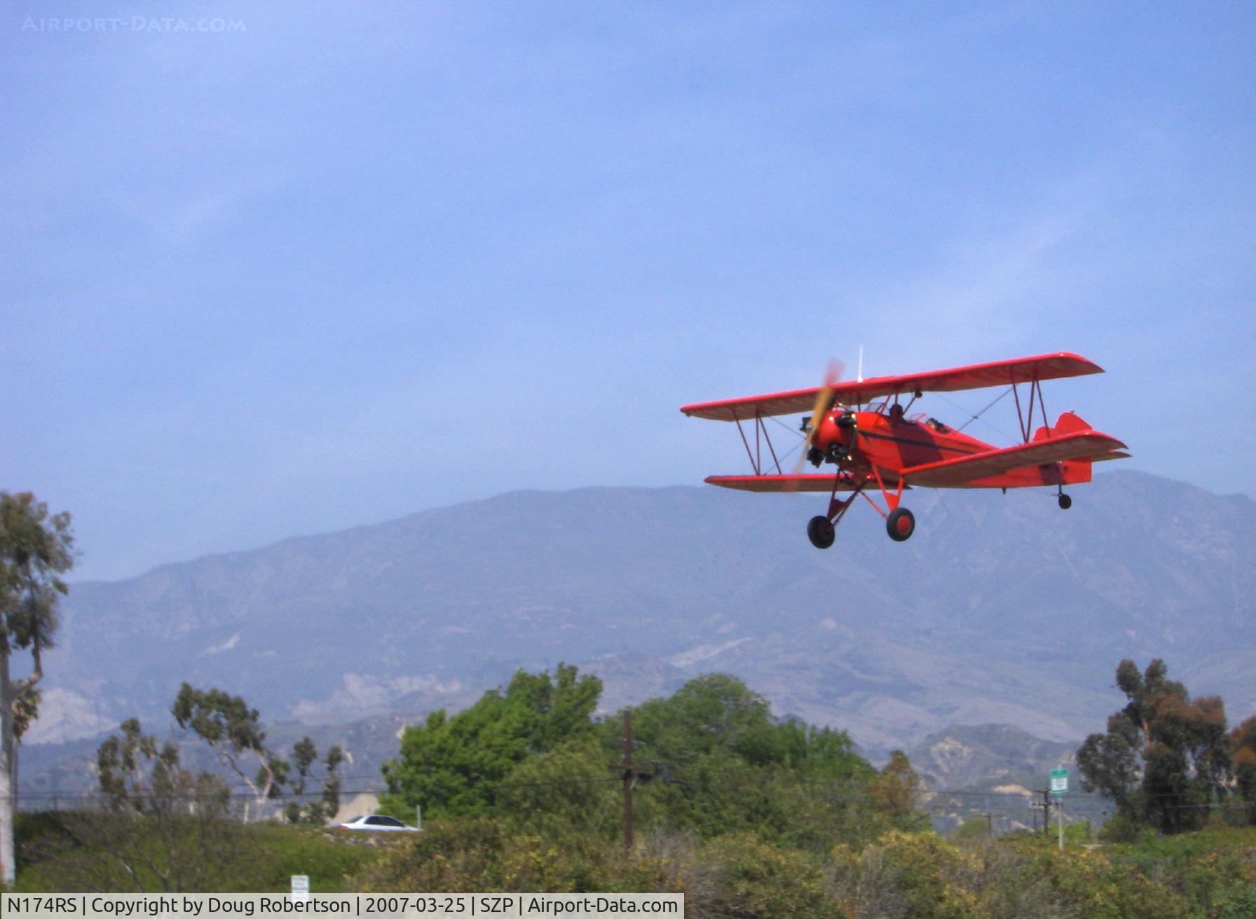 N174RS, 1936 Fleet 7B C/N 62, 1937 Fleet 7B, Kinner 5B 125 hp 5 cylinder radial, engine rebuilt by Kinner expert at SZP, on short final for Rwy 22. N174RS is shown aloft in DVD 'One Six Right', not to be missed!