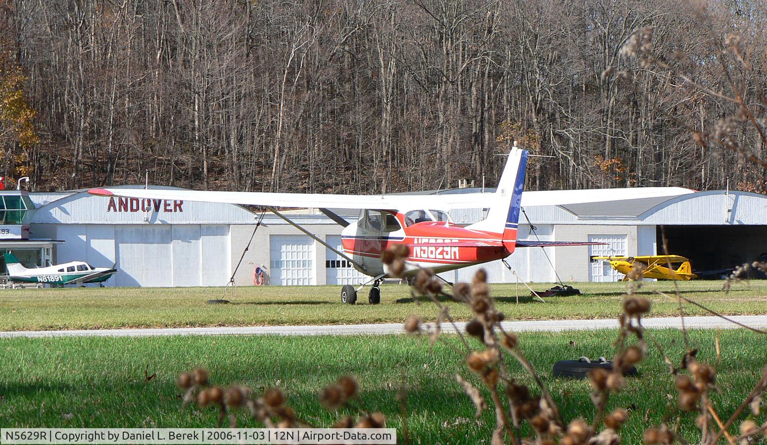 N5629R, 1965 Cessna 172F C/N 17253248, Nice 1965 Cessna Skyhawk, as seen through the woods at Aerflex Andover.