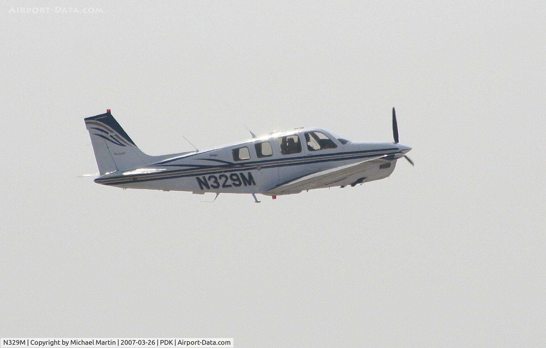 N329M, Raytheon Aircraft Company A36 Bonanza C/N E-3490, Departing PDK enroute to FMY