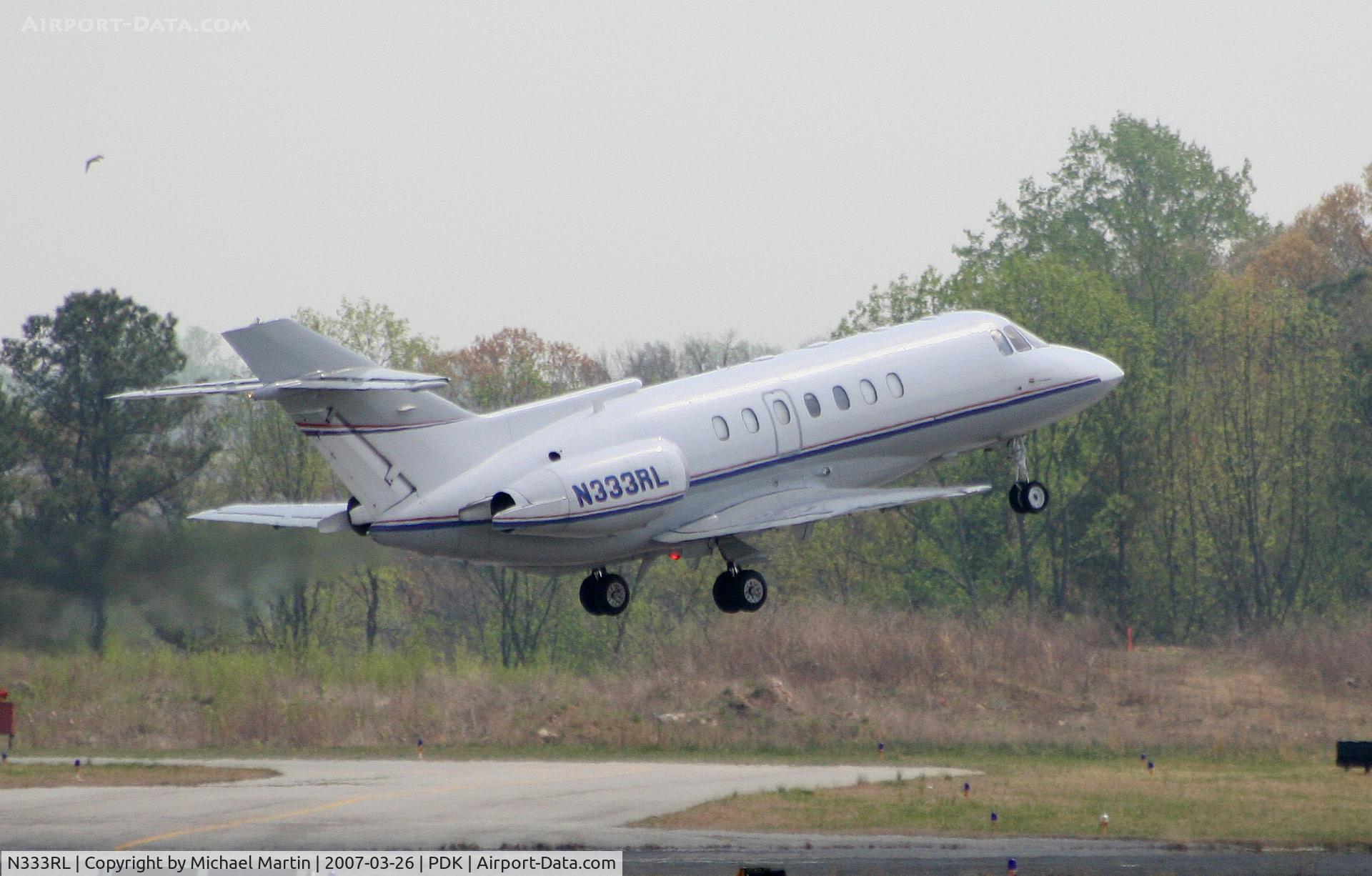 N333RL, 1992 British Aerospace BAe.125-1000A C/N 259027, Departing PDK enroute to PBI