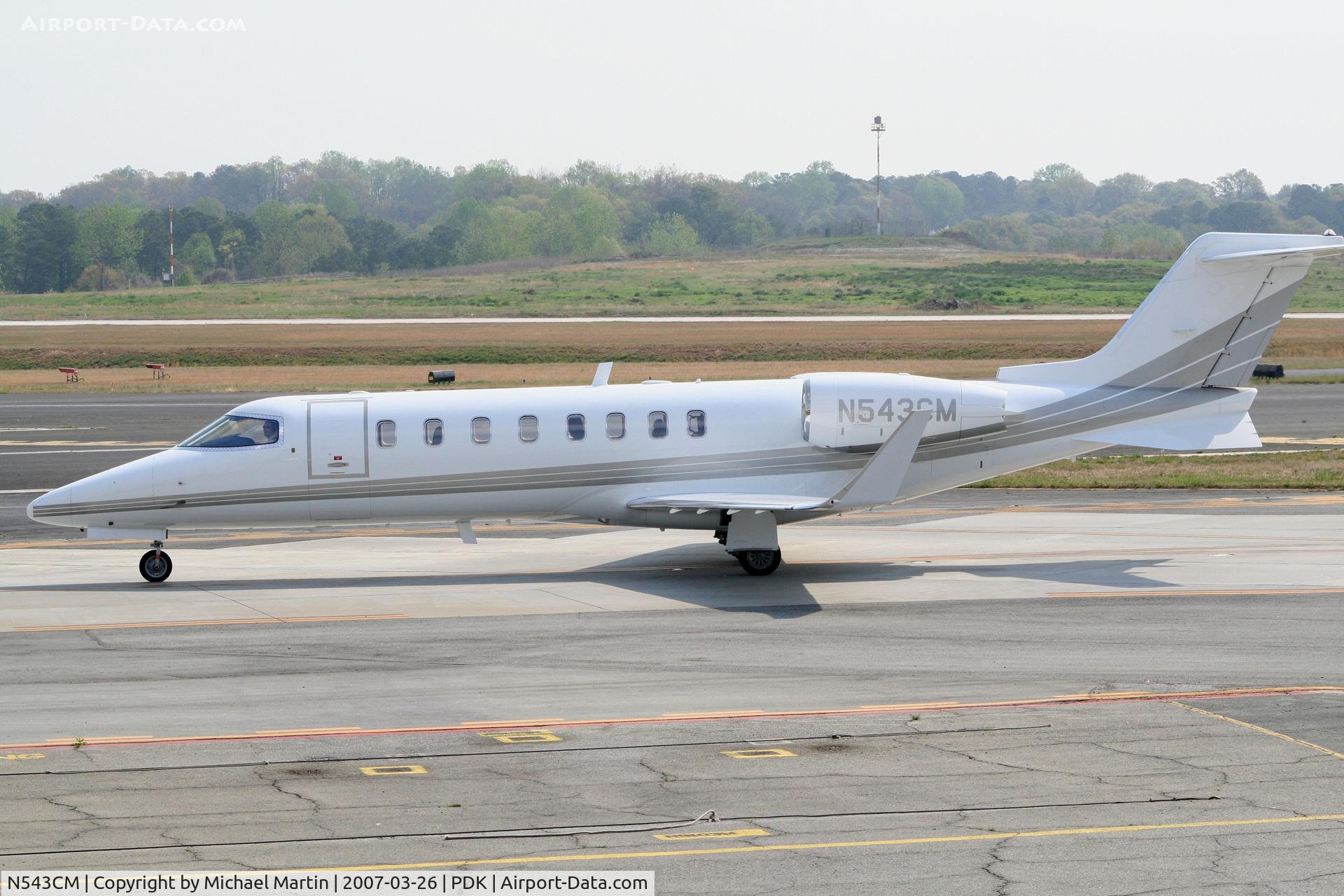 N543CM, 1999 Learjet Inc 45 C/N 062, Taxing to Epps Air Service