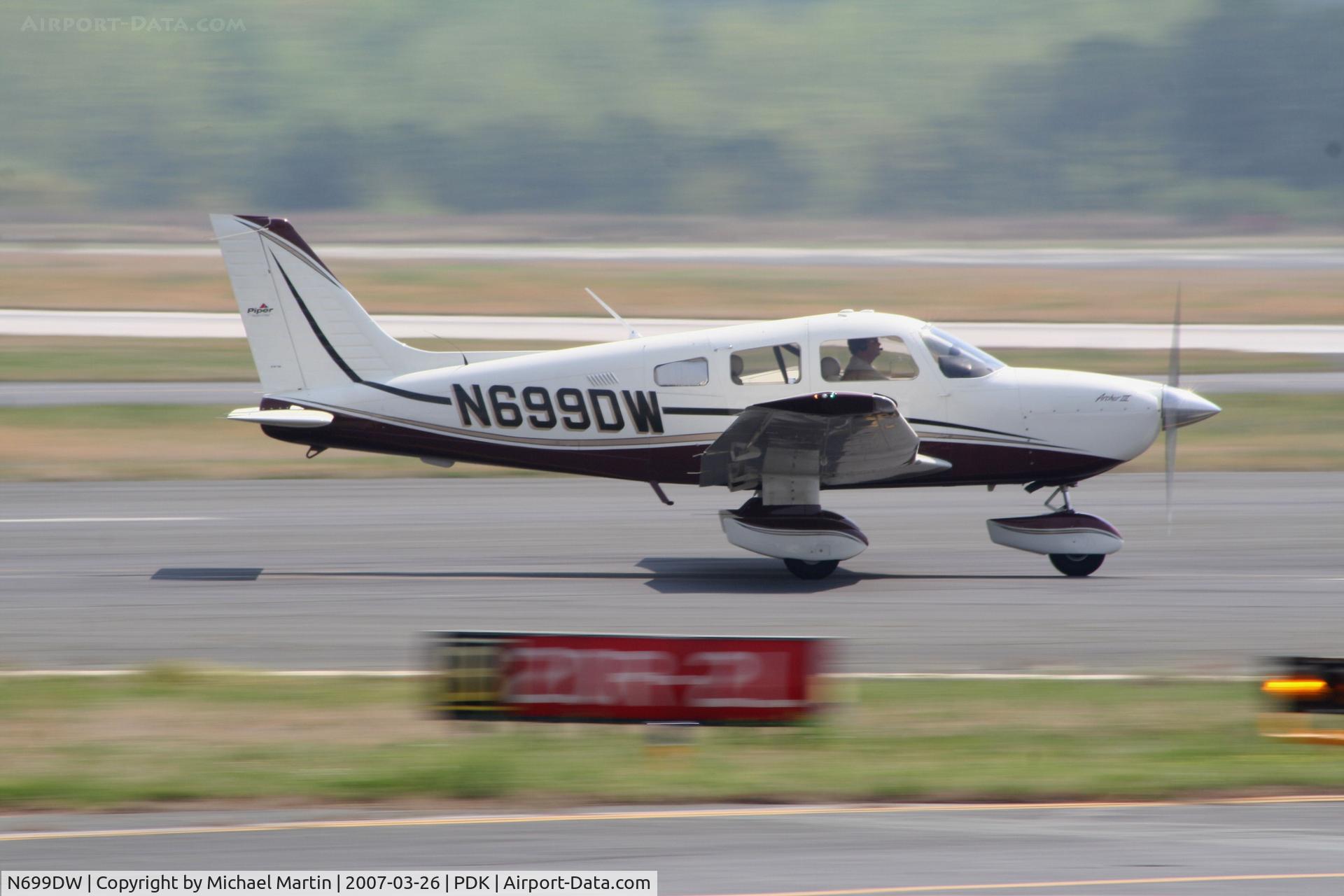 N699DW, 2005 Piper PA-28-181 C/N 2843612, Departing PDK enroute to CRG