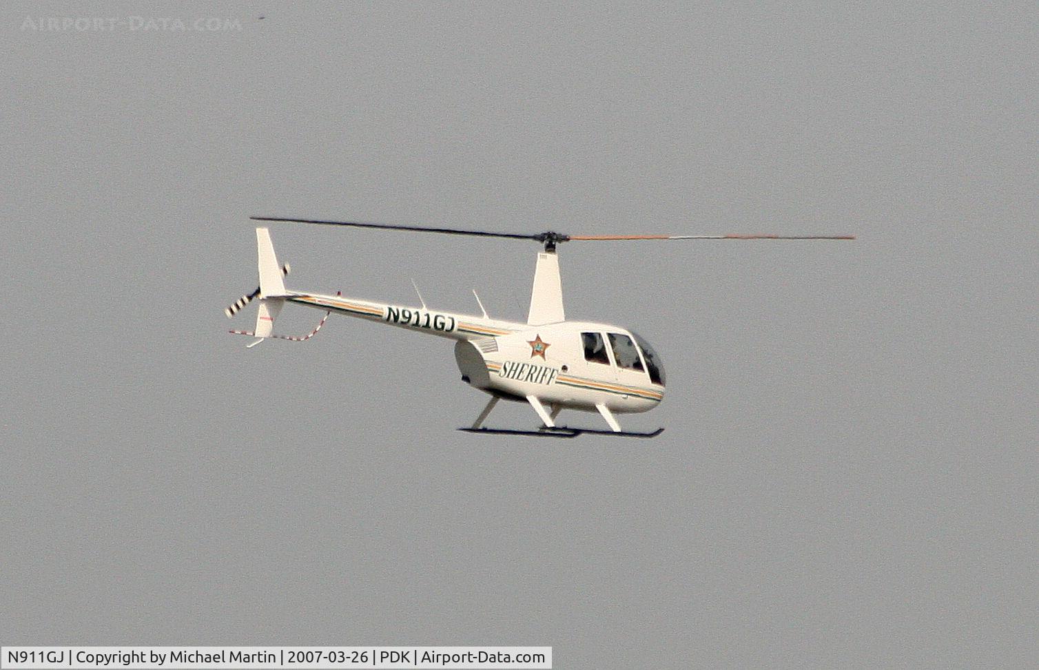 N911GJ, 2006 Robinson R44 II C/N 11054, Departing PDK enroute home