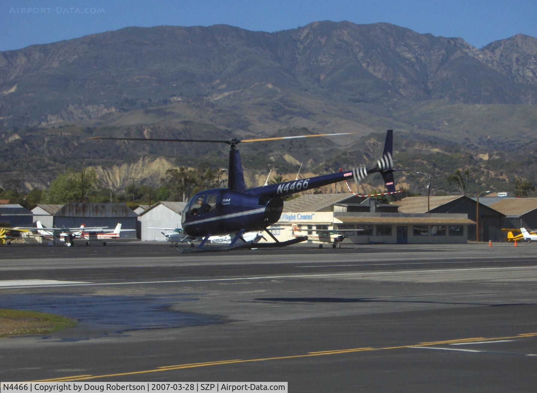 N4466, 2004 Robinson R44 II C/N 10374, 2004 Robinson R44 CLIPPER II  w/pop-out floats, Lycoming IO-540 260 hp derated to 225 Hp for takeoff, 205 hp continuous, crossing Rwy 22 to refuel